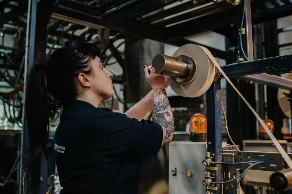 Employee in the factory at Unilin Insulation