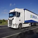 Unilin Insulation Lorry travelling on the road to deliver orders