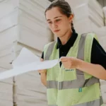 Unilin Insulation Girl working in factory